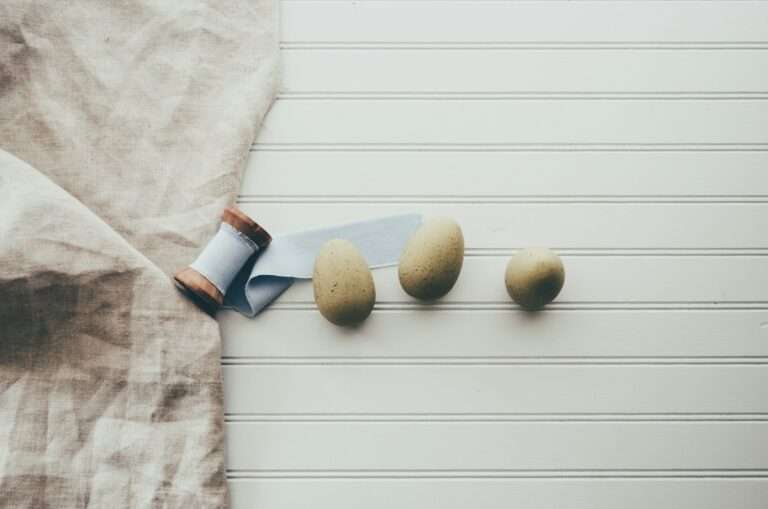 three oval gray pebbles